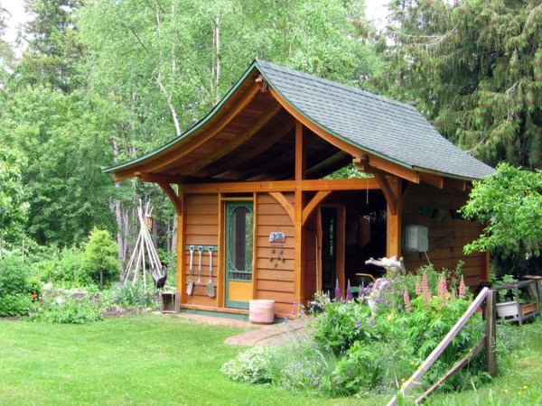 elegant and beautiful garden house compact design garden houses made of wood nice and compact garden shed in the backyard