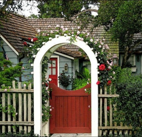 cool garden design with rose arch