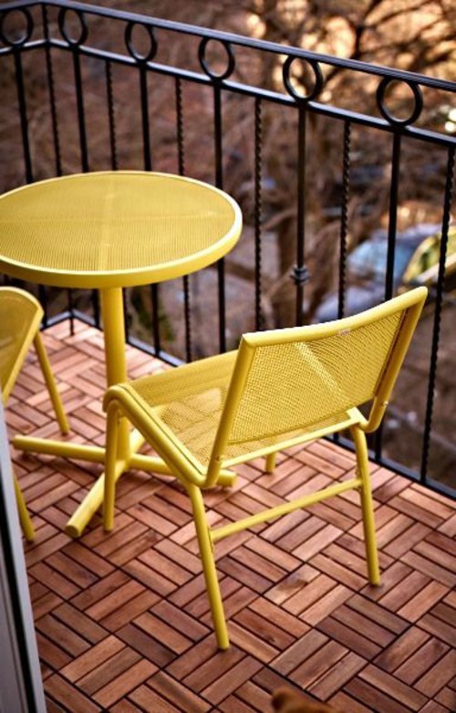 Wood tiling - wooden floor on the balcony Wood tiling - wooden floor on the balcony