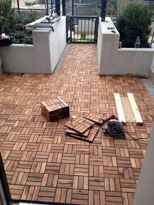 Wood tiling - wooden floor on the balcony Wood tiling - wooden floor on the balcony
