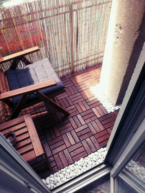 Wood tiling - wooden floor on the balcony Wood tiling - wooden floor on the balcony