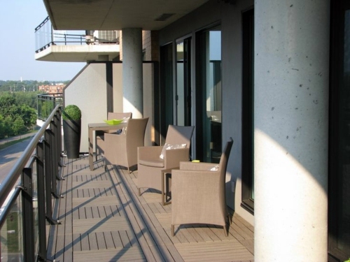 Wood tiling - wooden floor on the balcony Wood tiling - wooden floor on the balcony