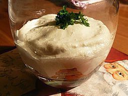 Cheesecake plant with herbs on a bed of carrots
