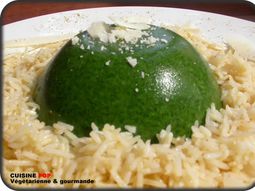 Domes fresh spinach on a bed of basmati rice