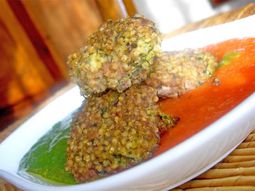 Millet dumplings and tomato coulis tetragonal