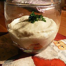 Cheesecake plant with herbs on a bed of carrots