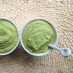 Green hummus and half raw peas and peas