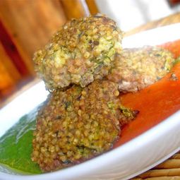Millet dumplings and tomato coulis tetragonal