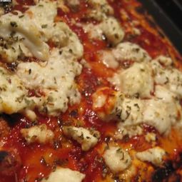 Pizza with goat cheese, and honey in the bush