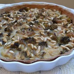 Vegan cake with broccoli and pine nuts