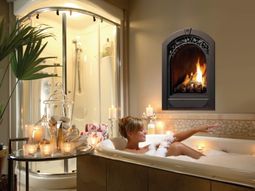25 Bathroom designs with built-in fireplaces – romantic atmosphere