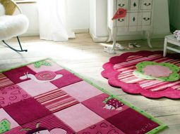 Beautiful designer carpet in the nursery of Esprit