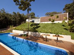 Bright youthful house in the rocky landscape in Brazil
