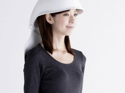 Chair and helmet combined in a