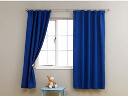 Cool Curtains in the nursery offer sun protection and charm