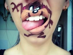 Creative make-up artist transforms her lips in cool cartoon characters