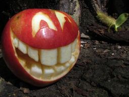 Decorative fruit carving – apple art and expressive faces