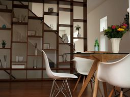 Dining room table with chairs that create a modern feel