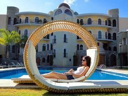 Double recliner outdoors by Victor M. Aleman