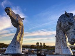 Huge Kelpies horse head sculptures tower over the Forth &amp; Clyde Canal in Scotland