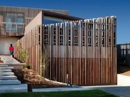 Modern residence with interior design from wood offers inviting lushness