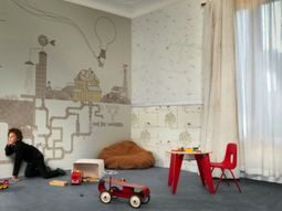 Ornate wallpaper in the nursery