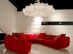 Red sofas in the living room of Marcel Wanders