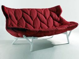 Red upholstered sofa by Patricia Urquiola for Kartell inShare22