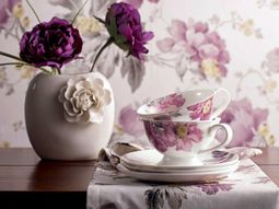 Wallpaper and fabrics with floral pattern for decoration in interior design