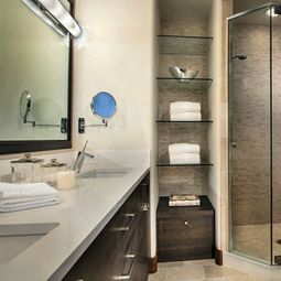A glass shelves are stylish and modern in the Room