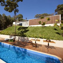 Bright youthful house in the rocky landscape in Brazil