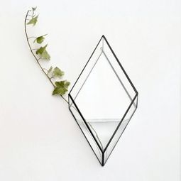 Designer furniture idea – vase on the wall. Can you imagine that?