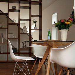 Dining room table with chairs that create a modern feel