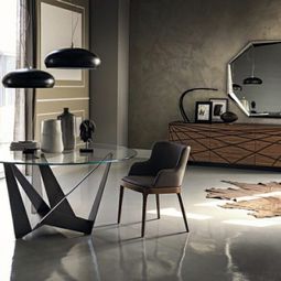 Modern dining tables with chairs show sculptural elegance
