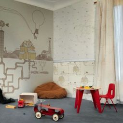 Ornate wallpaper in the nursery