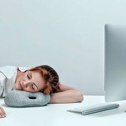 Ostrich Pillow Travel Pillow for napping on the go or in the office
