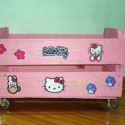 Pink storage box on wheels made of wood pallets