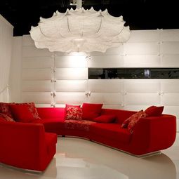 Red sofas in the living room of Marcel Wanders