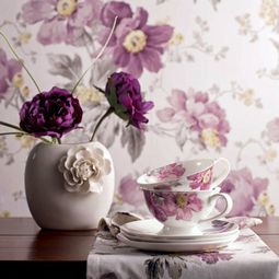 Wallpaper and fabrics with floral pattern for decoration in interior design