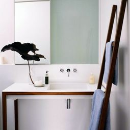 Wooden towel ladder in both rustic as well as in modern bathroom