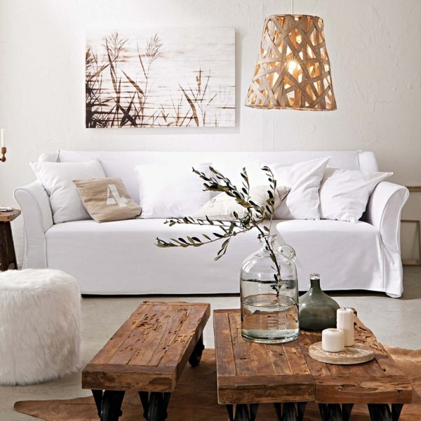 A wooden coffee table in the living room adds warmth and naturalness in