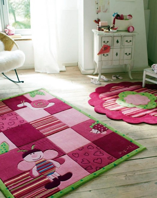Beautiful designer carpet in the nursery of Esprit