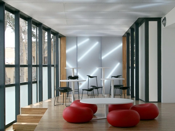 Bright red seat cushions for strange living room or great pool design