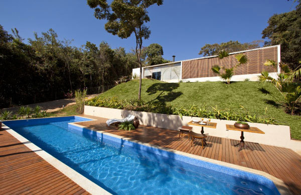 Bright youthful house in the rocky landscape in Brazil