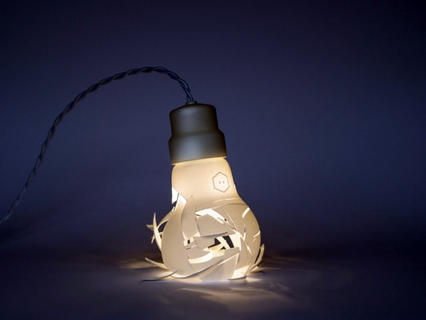 Broken designer lamps in the form of oversized light bulbs