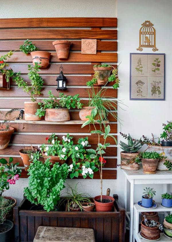 Create a vertical garden for your home by wooden panels