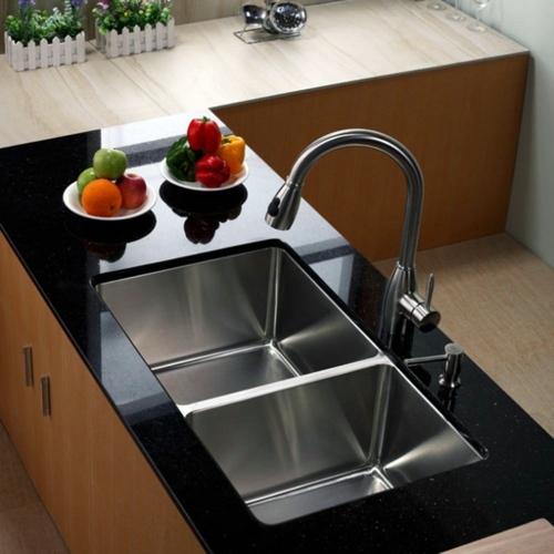 How should one choose the material of the sink in the kitchen