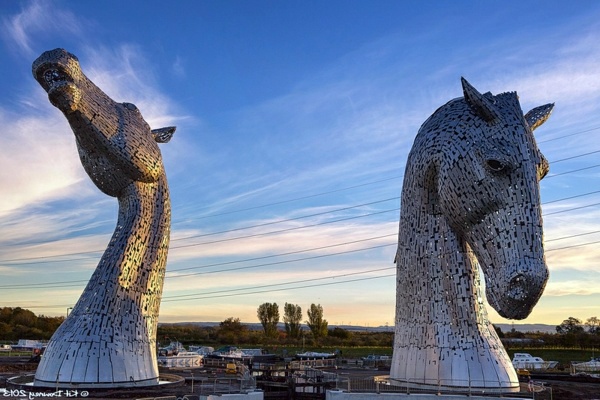 Huge Kelpies horse head sculptures tower over the Forth & Clyde Canal in Scotland