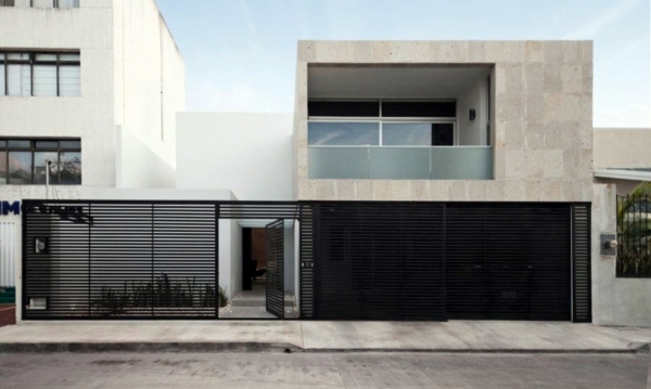 Minimalist house with an industrial touch in Canun, Mexico