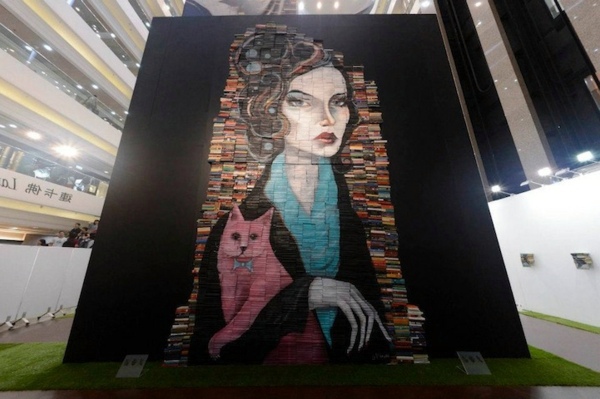 Whimsical paintings from books by Mike Stilkey
